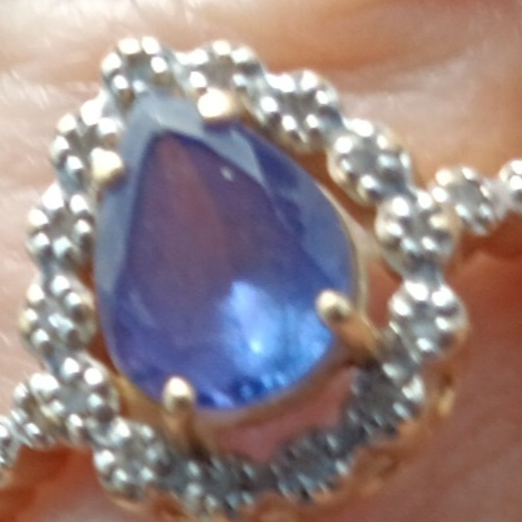18 K Diamond & Tourmaline Ring.